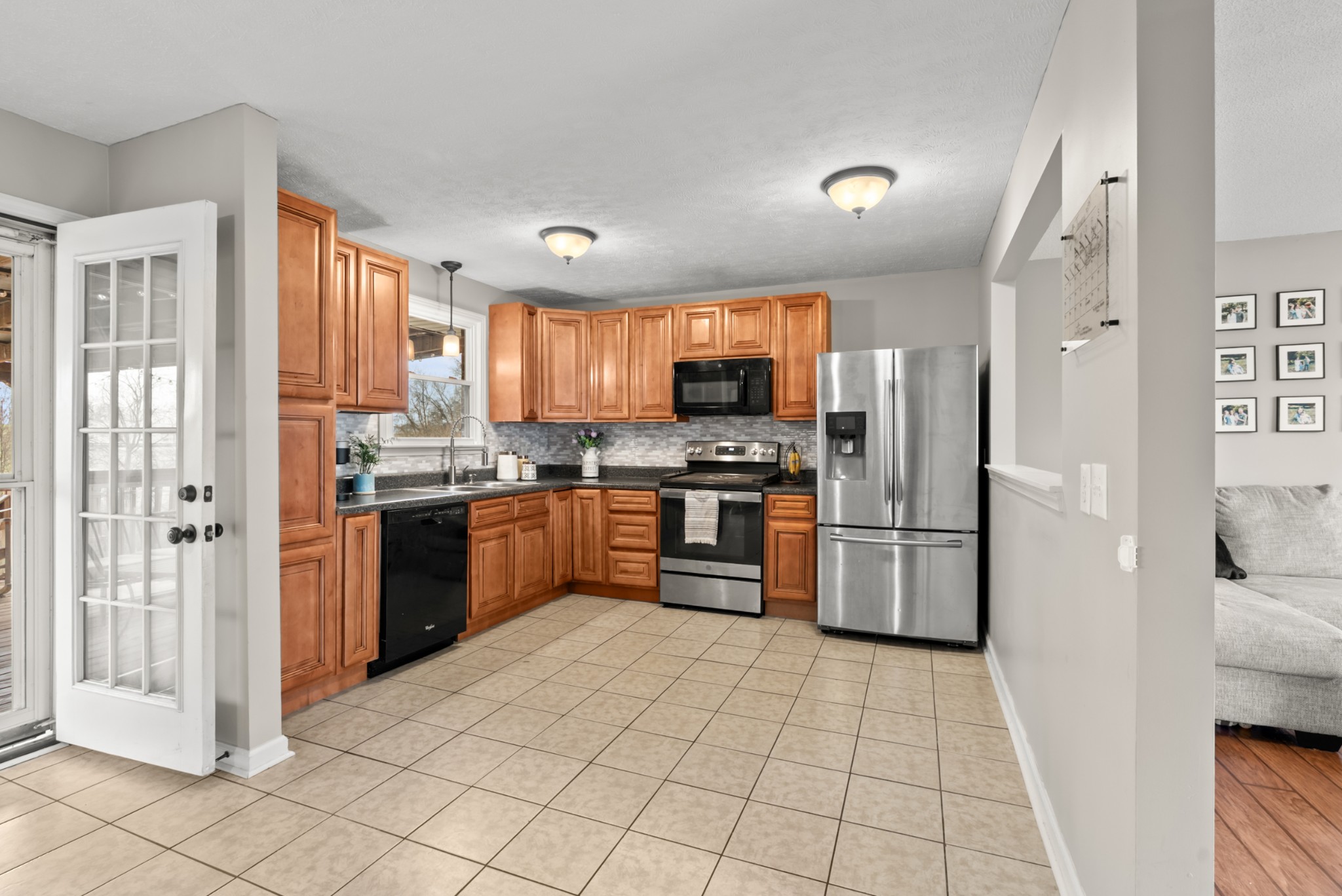4005 Fawn Drive Springfield, TN 37172 - Photo 6 of 40 a kitchen with stainless steel appliances granite countertop a refrigerator and a stove top oven