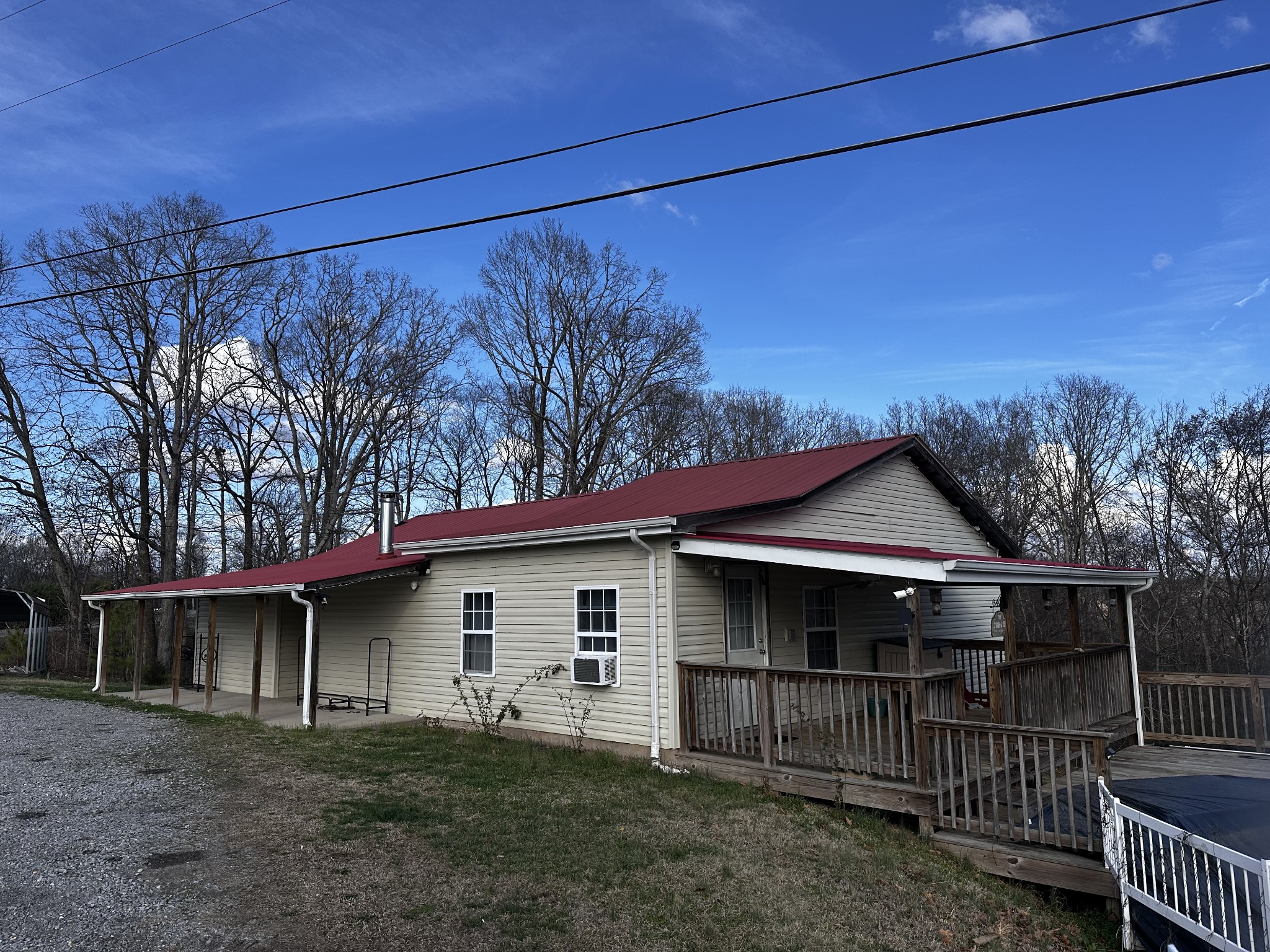 1306 Bumpus Mills Road Dover, TN 37058 - Photo 2 of 9 a view of a house with a yard