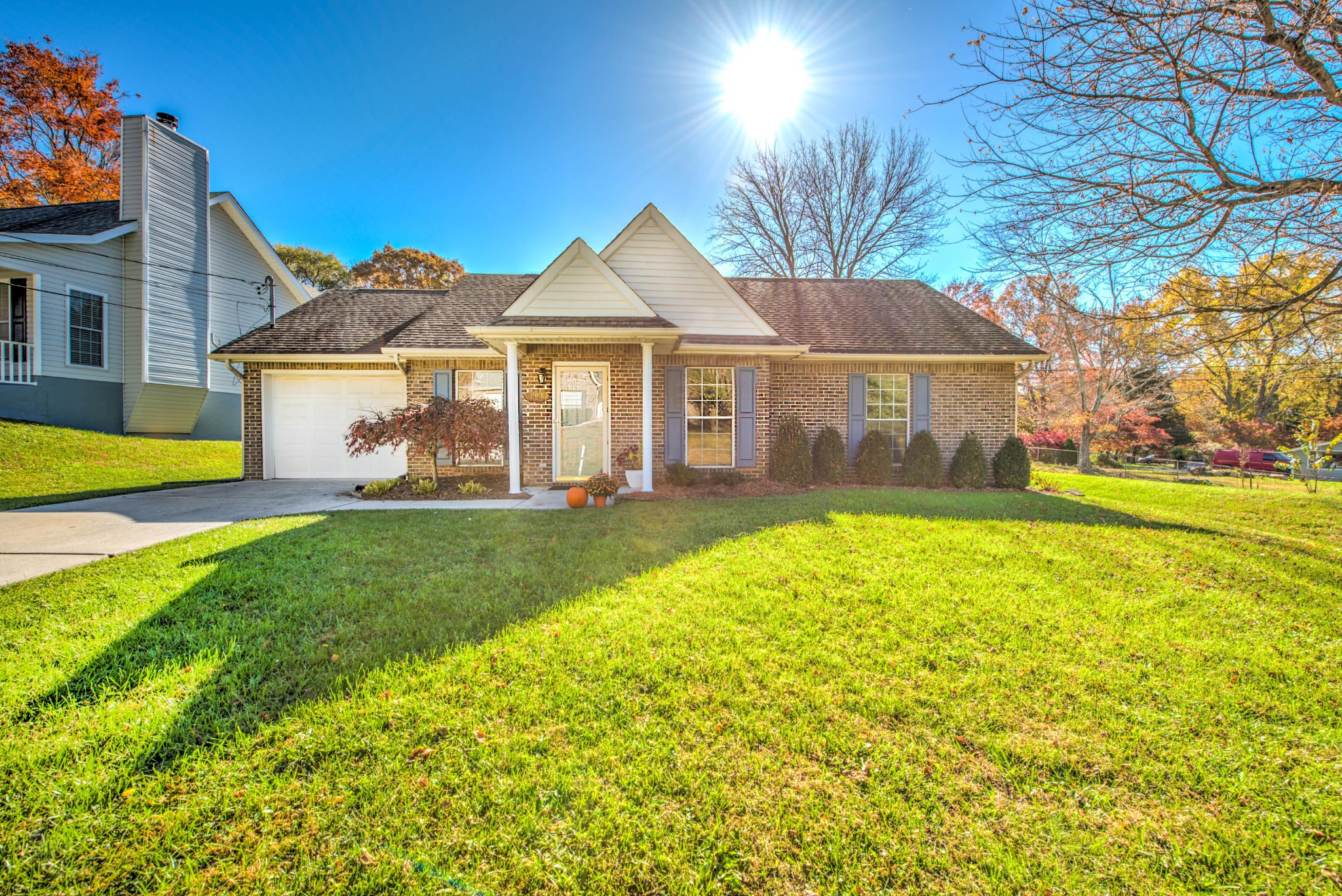 4356 Walnut Ridge Lane Knoxville, TN 37921 - Photo 1 of 23 a front view of a house with garden