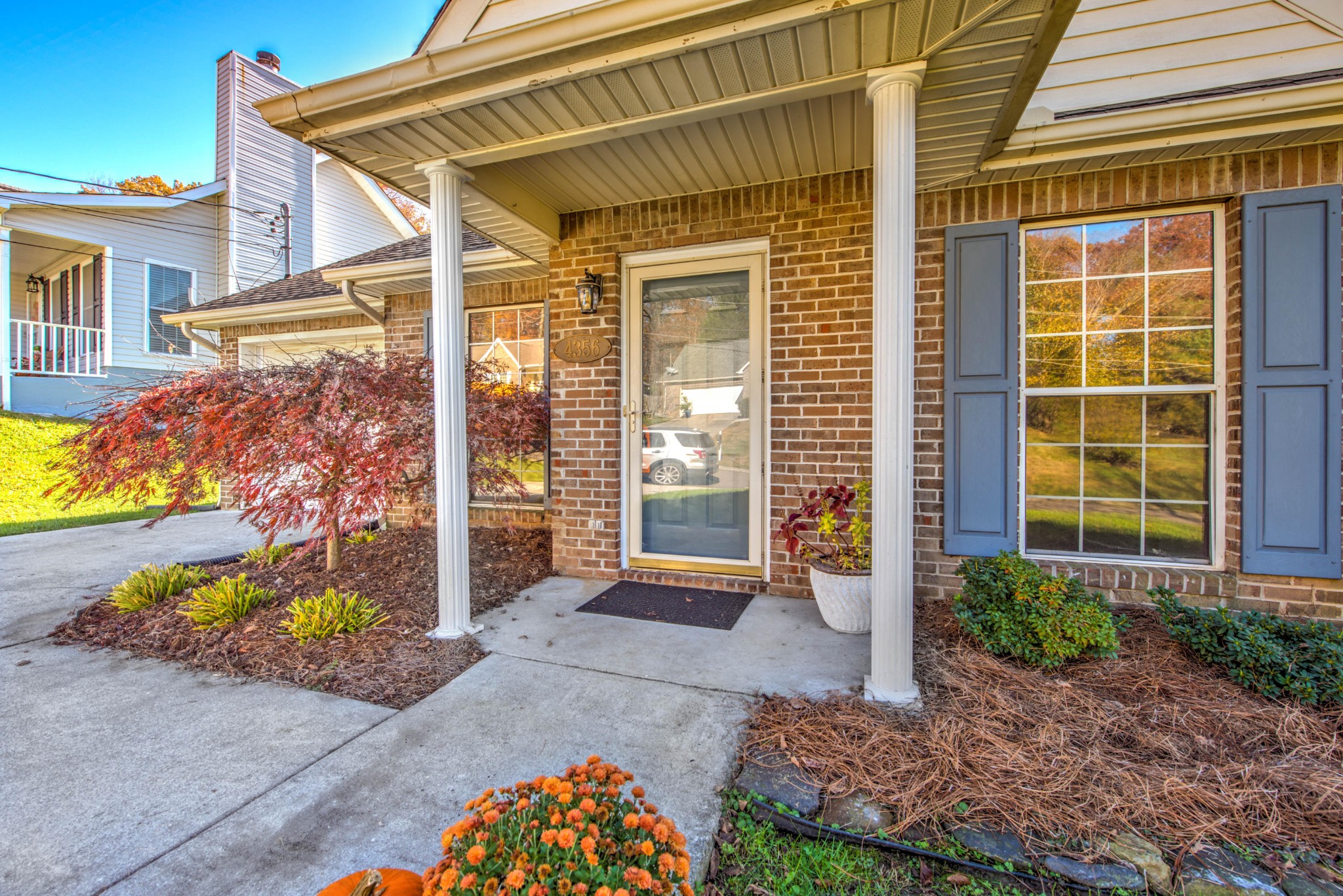 4356 Walnut Ridge Lane Knoxville, TN 37921 - Photo 3 of 23 a front view of a house with a yard