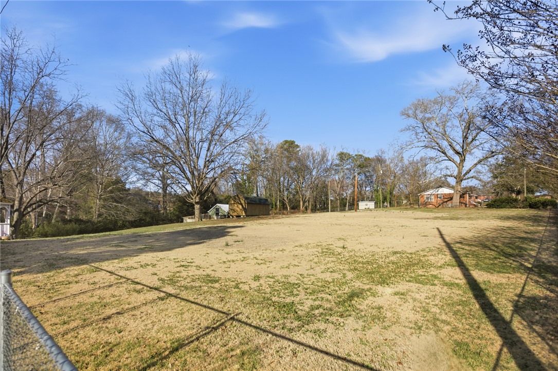 1005 Pinecroft Drive Anderson, SC 29621 - Photo 11 of 50 Expansive lot offers ample space, a perfect canvas for outdoor aspirations.