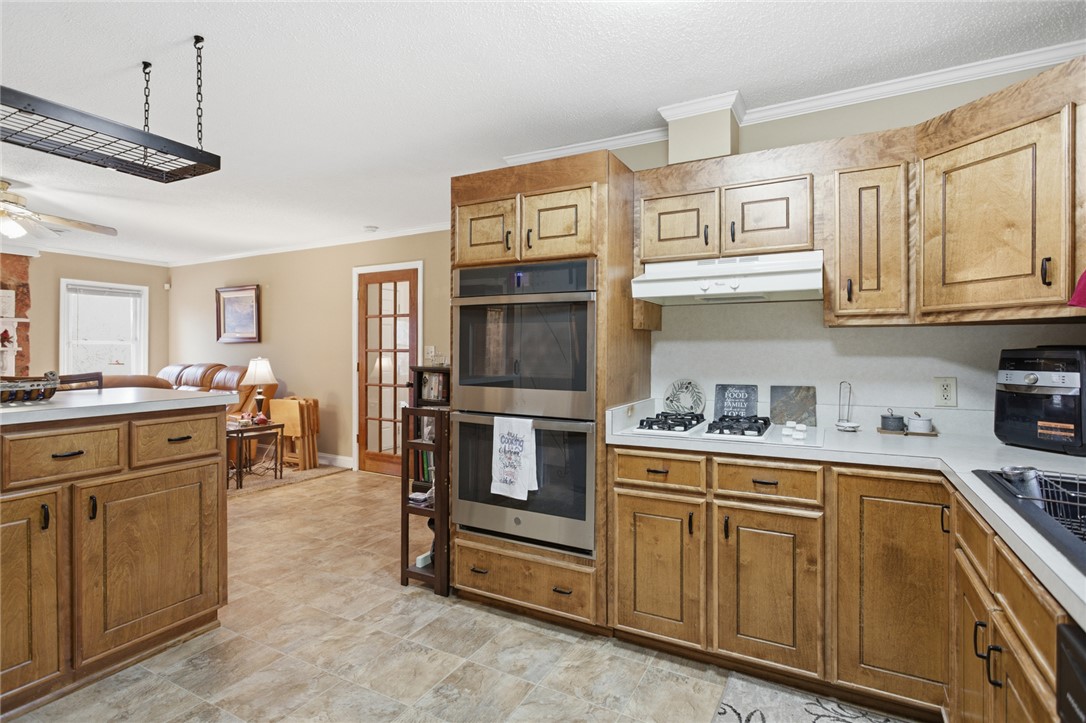 1005 Pinecroft Drive Anderson, SC 29621 - Photo 25 of 50 This spacious kitchen offers a seamless flow into the living area, perfect for entertaining.