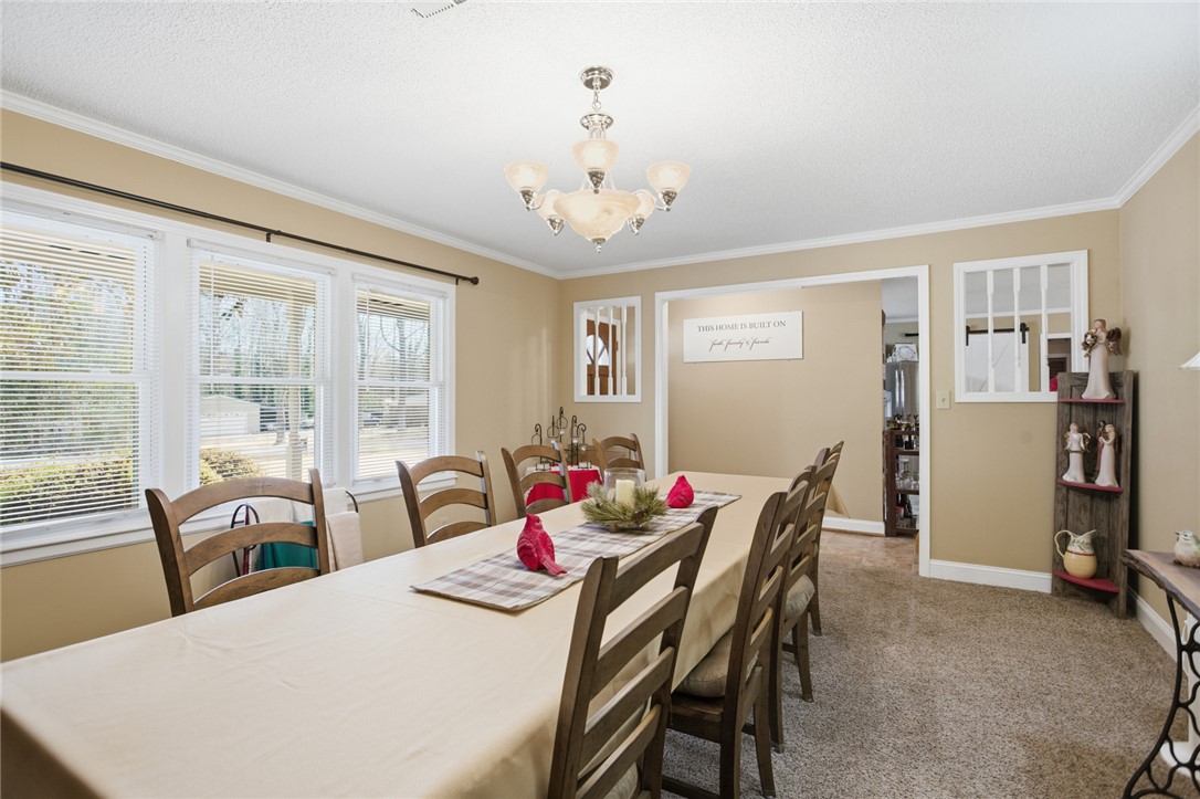 1005 Pinecroft Drive Anderson, SC 29621 - Photo 28 of 50 This dining room offers a comfortable atmosphere perfect for gatherings.