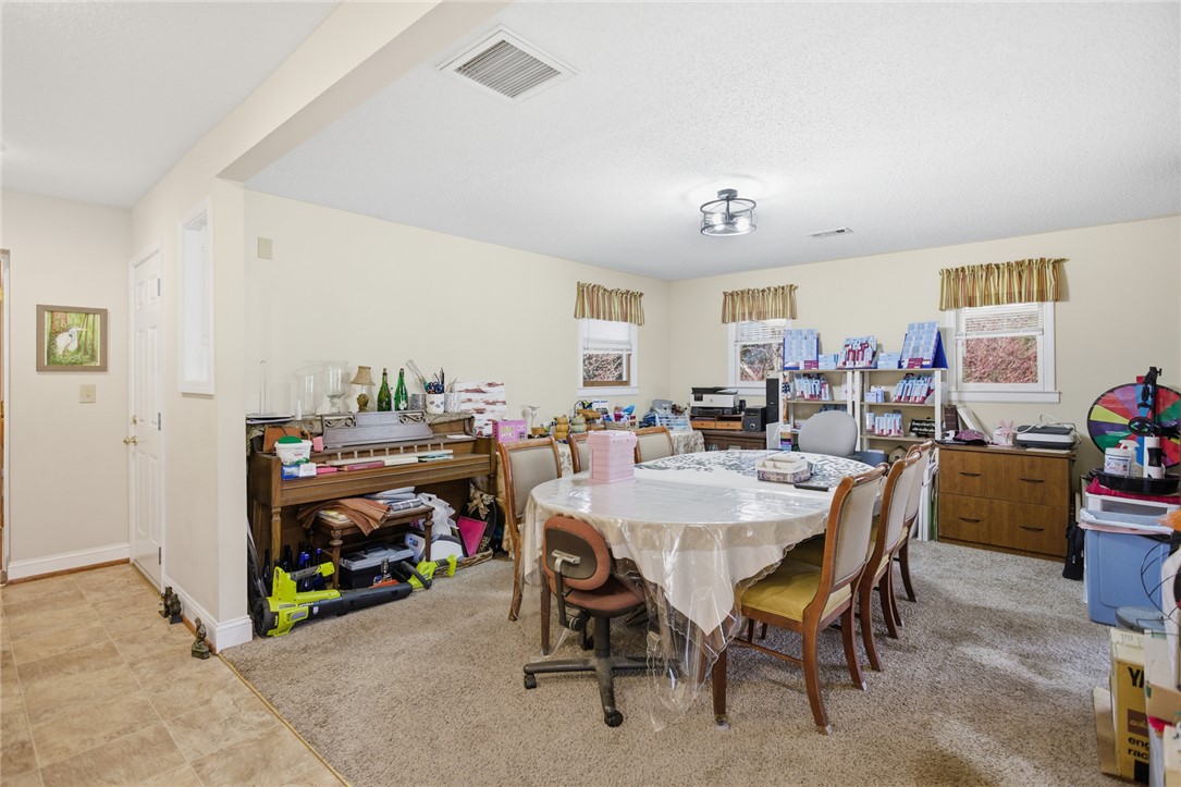1005 Pinecroft Drive Anderson, SC 29621 - Photo 30 of 50 This versatile room offers an open layout perfect for various activities.