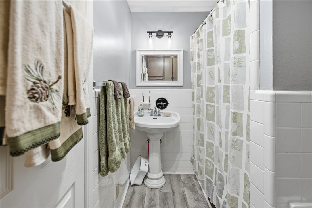 1005 Pinecroft Drive Anderson, SC 29621 - Photo 33 of 50 This bathroom features stylish fixtures and flooring, creating a functional and attractive space.