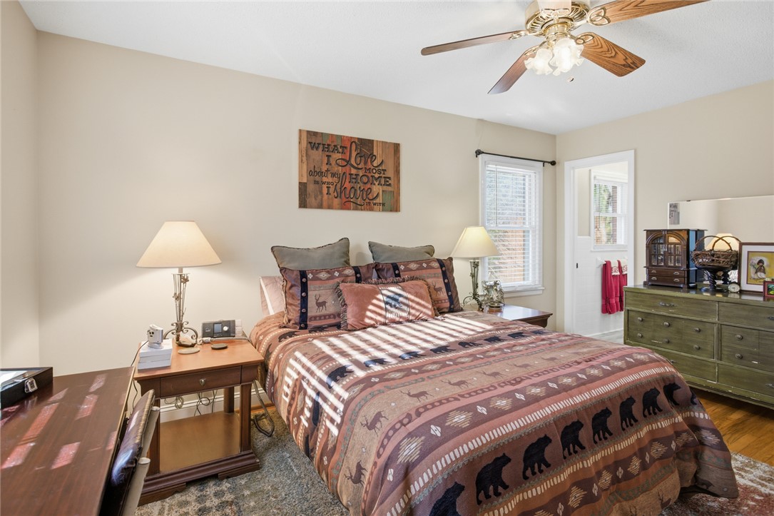 1005 Pinecroft Drive Anderson, SC 29621 - Photo 34 of 50 This cozy bedroom offers a tranquil retreat with warm lighting and ample natural light.