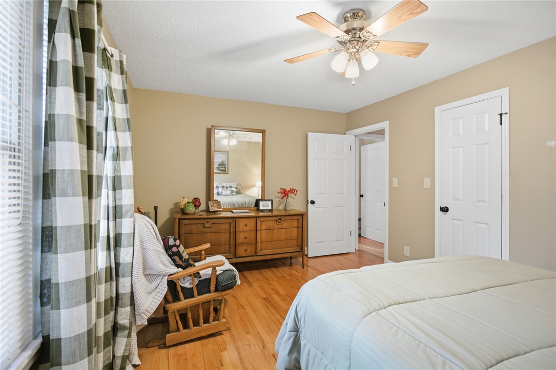 1005 Pinecroft Drive Anderson, SC 29621 - Photo 40 of 50 This spacious bedroom offers comfortable living with warm wood floors and ample natural light.