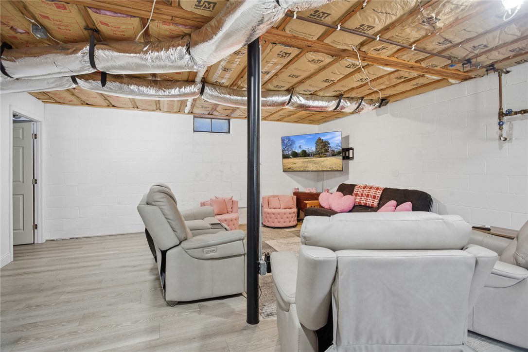 1005 Pinecroft Drive Anderson, SC 29621 - Photo 41 of 50 This versatile basement space offers endless possibilities for recreation and relaxation.