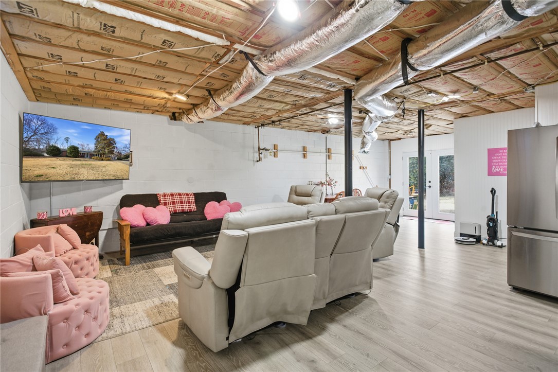 1005 Pinecroft Drive Anderson, SC 29621 - Photo 42 of 50 This versatile basement space offers comfortable living with a practical and functional layout.