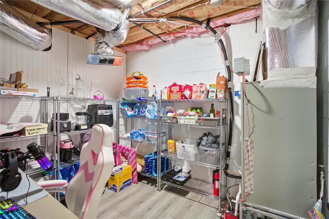 1005 Pinecroft Drive Anderson, SC 29621 - Photo 48 of 50 This spacious basement offers ample storage and versatile utility space.