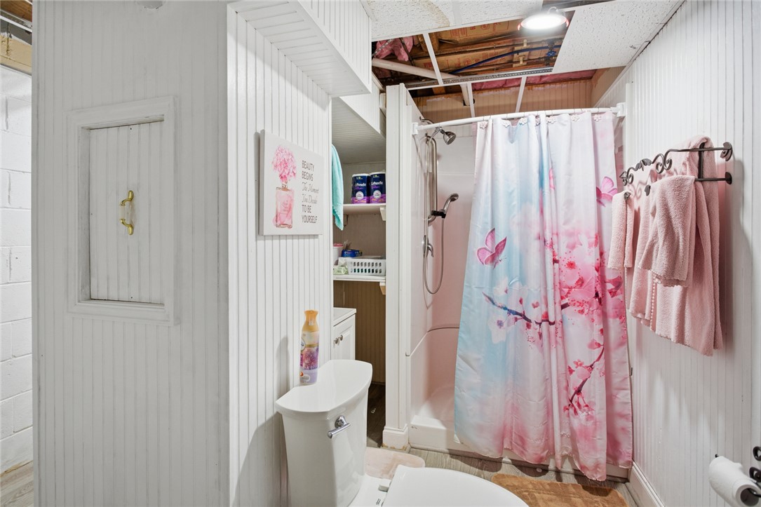 1005 Pinecroft Drive Anderson, SC 29621 - Photo 49 of 50 This functional bathroom features a shower and a toilet, offering convenience and utility.