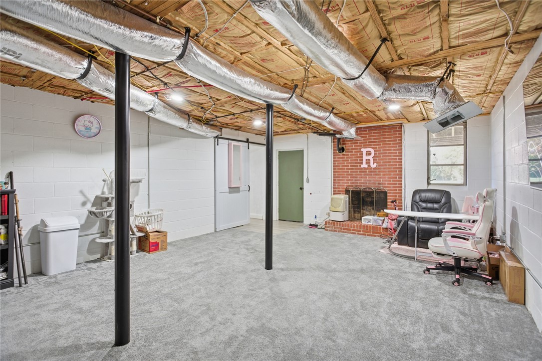 1005 Pinecroft Drive Anderson, SC 29621 - Photo 50 of 50 This versatile basement space offers ample room for recreation and relaxation.