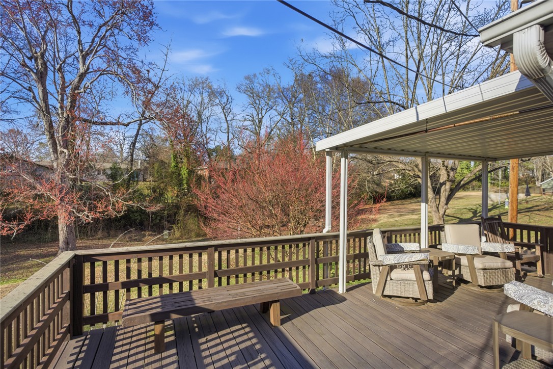 1005 Pinecroft Drive Anderson, SC 29621 - Photo 7 of 50 This spacious deck provides an ideal setting for relaxation and outdoor enjoyment.