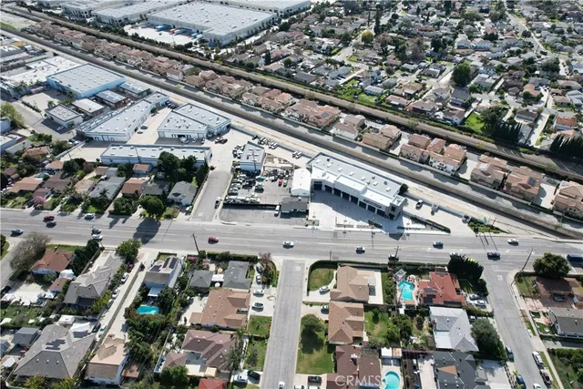 a room with gym equipment and a view of living room
