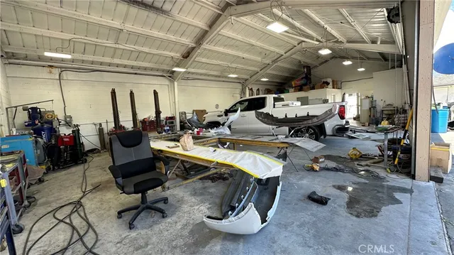 a view of outdoor space with seating area and barbeque oven