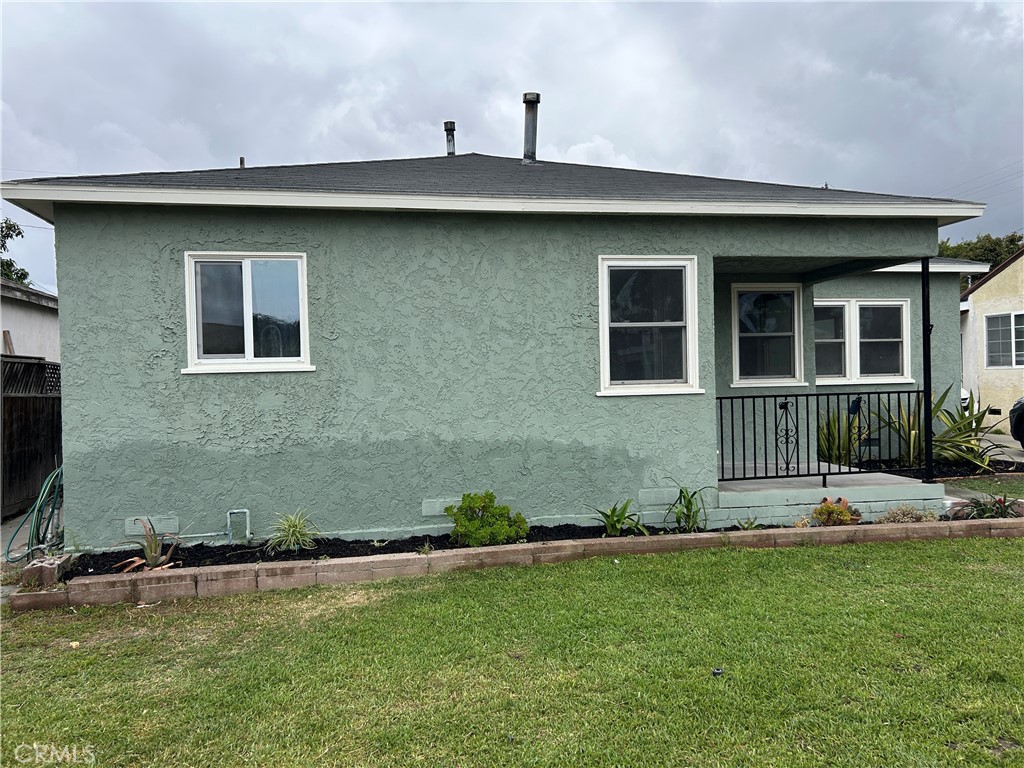 3375 Baltic Avenue Long Beach, CA 90810 - Photo 2 of 24 a front view of a house with a yard