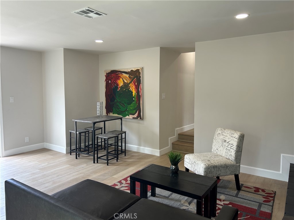 3375 Baltic Avenue Long Beach, CA 90810 - Photo 5 of 24 a dining room with furniture and wooden floor