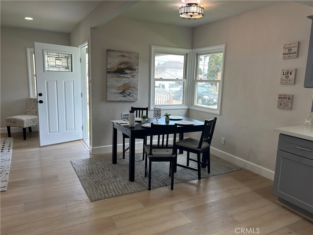 3375 Baltic Avenue Long Beach, CA 90810 - Photo 6 of 24 a dining room with furniture and window