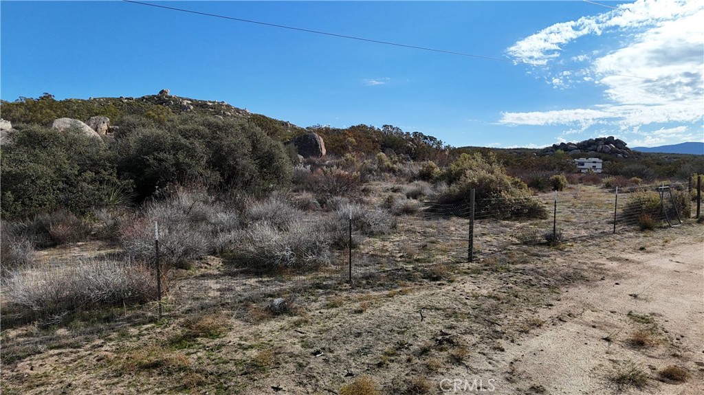 1 Ridgecrest Aguanga, CA 92536 - Photo 20 of 27 a view of a dry yard with mountains in the background