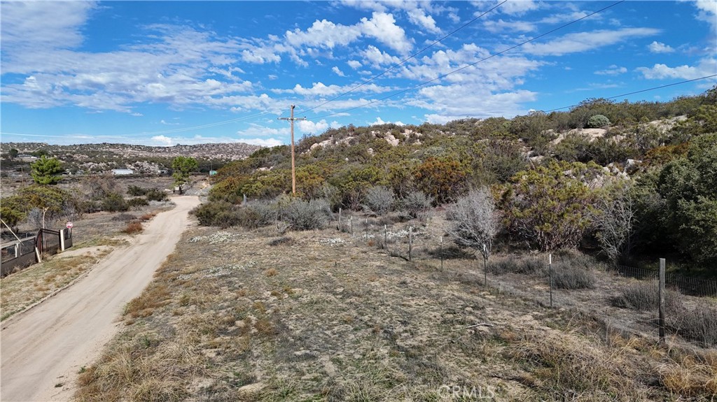 1 Ridgecrest Aguanga, CA 92536 - Photo 25 of 27 a view of a dry yard with mountains in the background