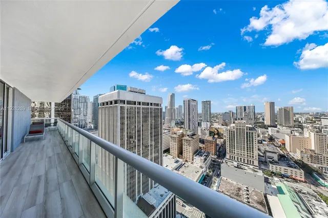 a view of a balcony with city view