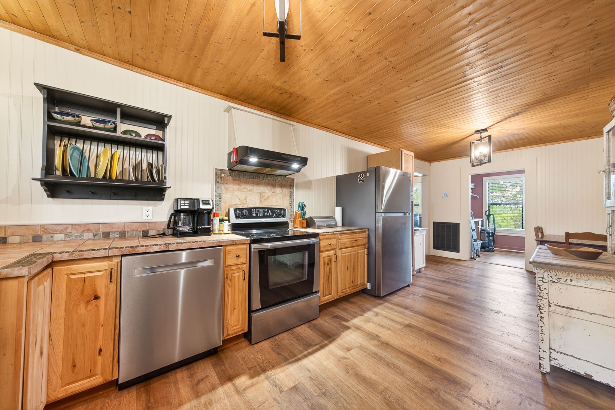 7400 Franks Ferry Road Walling, TN 38587 - Photo 13 of 55 a kitchen with stainless steel appliances granite countertop a stove and a refrigerator