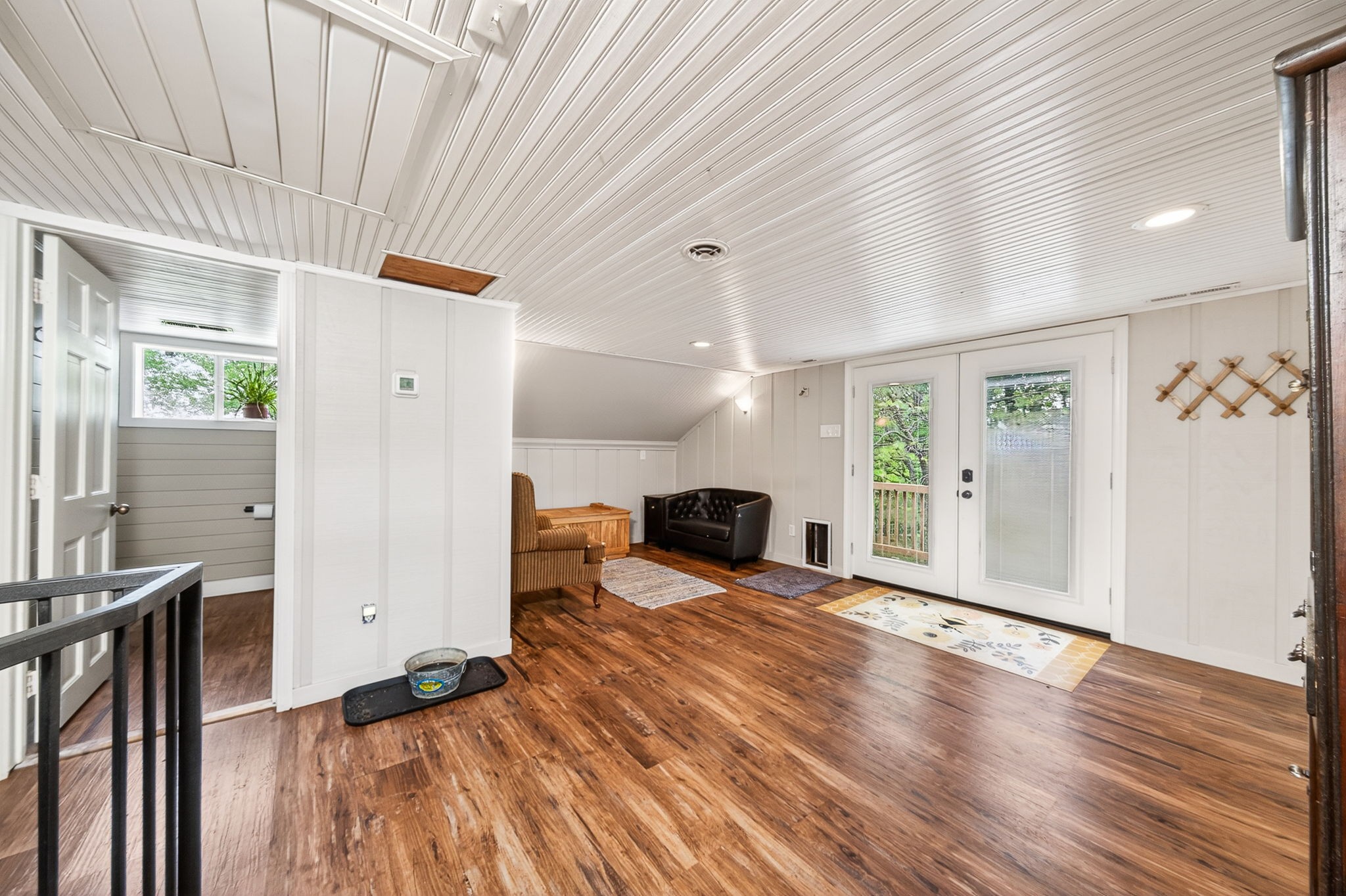 7400 Franks Ferry Road Walling, TN 38587 - Photo 23 of 55 a view of a livingroom with furniture and an empty room