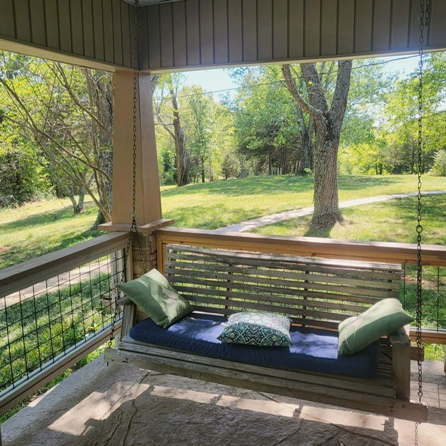 7400 Franks Ferry Road Walling, TN 38587 - Photo 42 of 55 a view of a bench in the back yard of the house