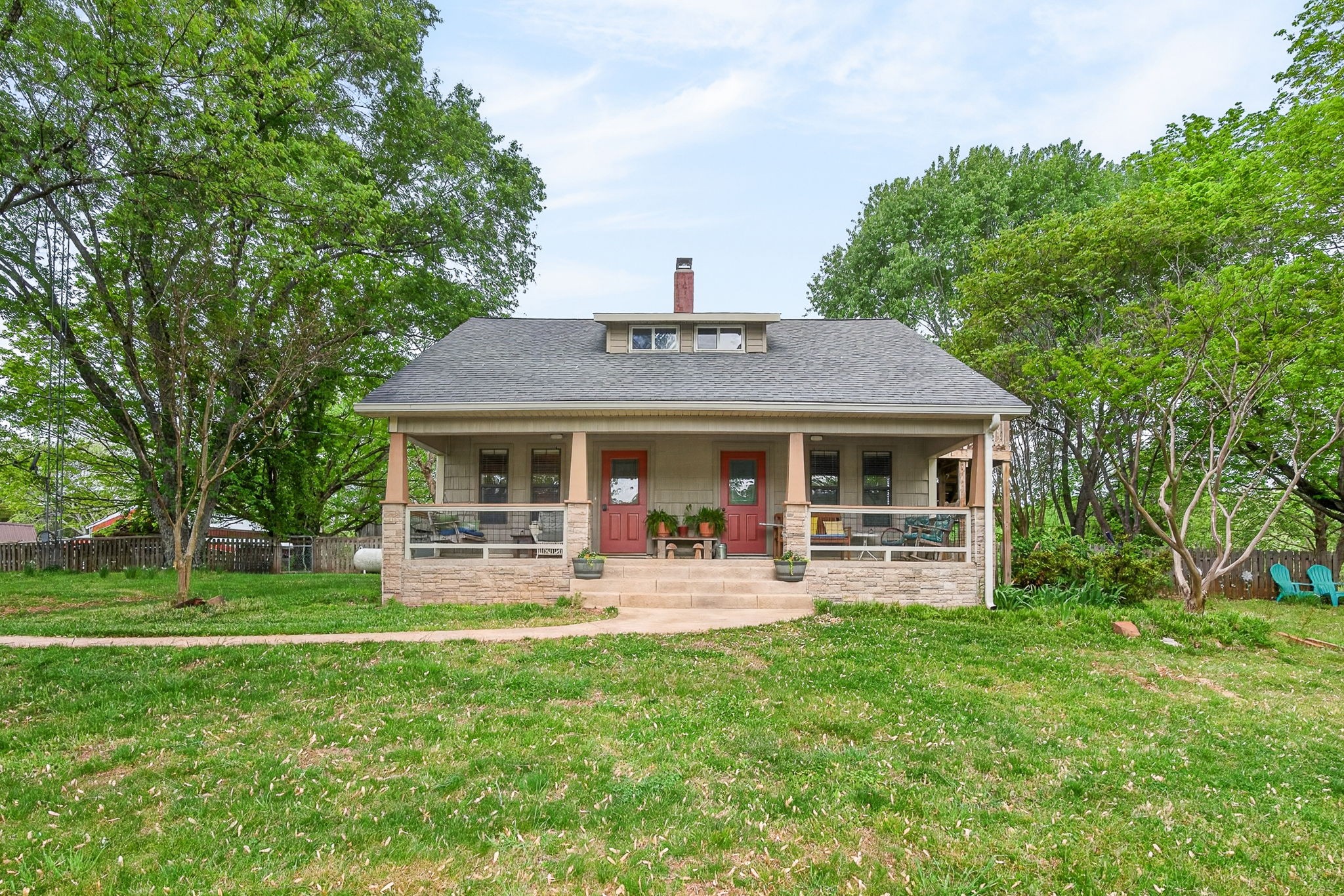 7400 Franks Ferry Road Walling, TN 38587 - Photo 5 of 55 a front view of house with yard outdoor seating and green space