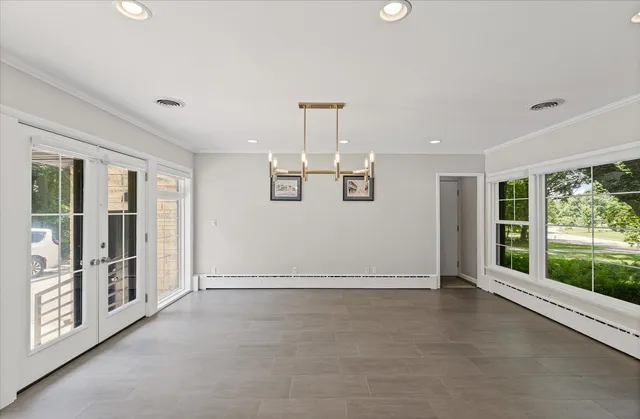 an empty room with windows