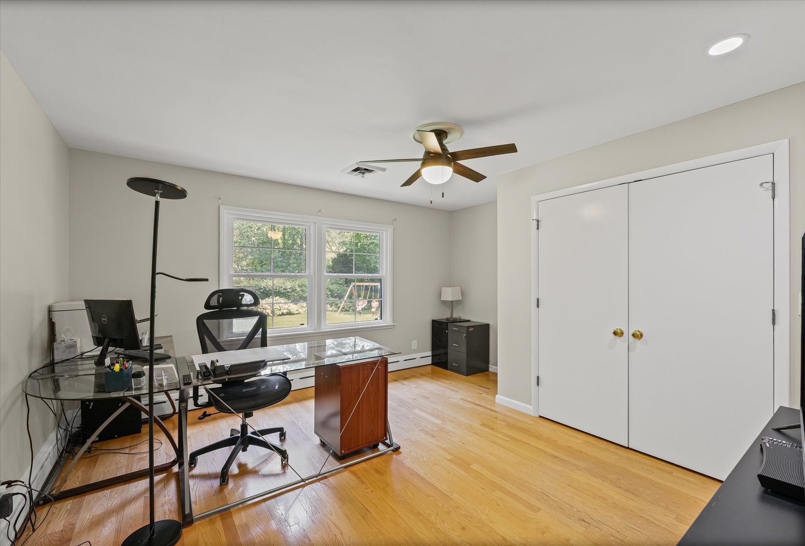 32 Greencroft Drive Champaign, IL 61821 - Photo 21 of 40 a view of a workspace with furniture and a window