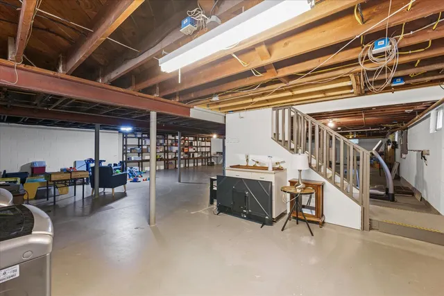 a view of a studio with wooden floor