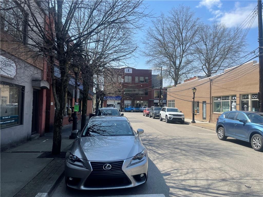 402 Loop, Unit LOOP Pittsburgh, PA 15215 - Photo 3 of 10 a car parked in front of house
