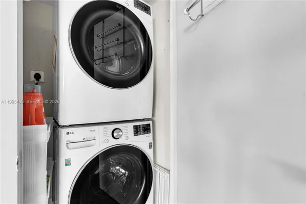 a sign that is on a brick wall