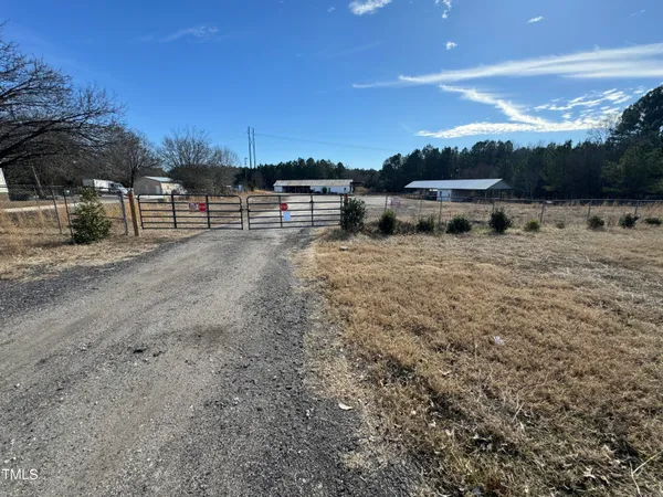 a view of swimming pool with outdoor seating and city view