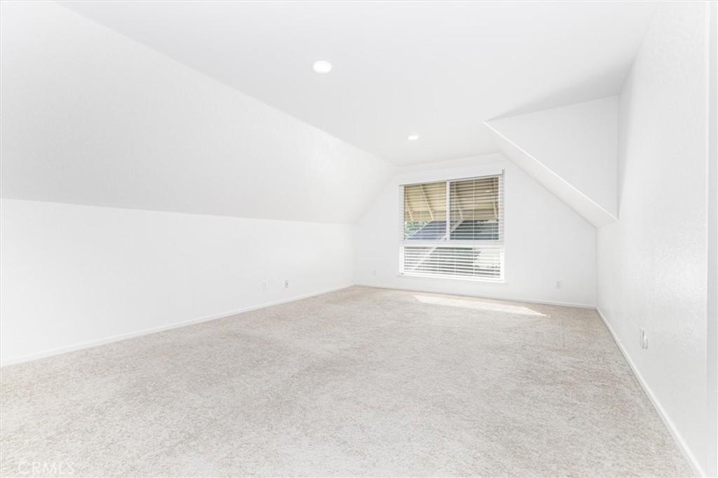 27139 Rio Prado Drive Valencia, CA 91354 - Photo 18 of 34 an empty room with windows