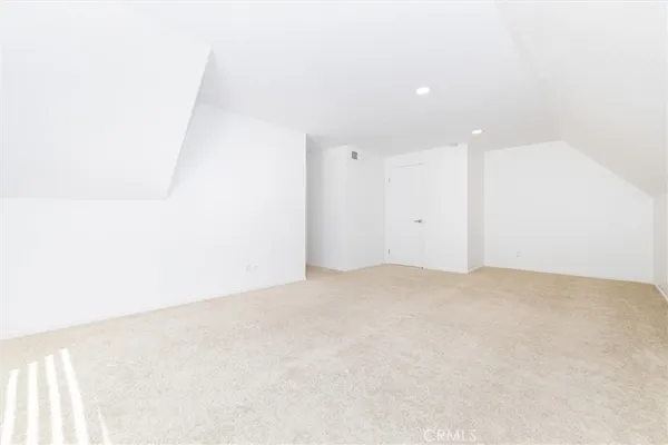 a bathroom with a granite countertop sink a mirror a shower and a shower