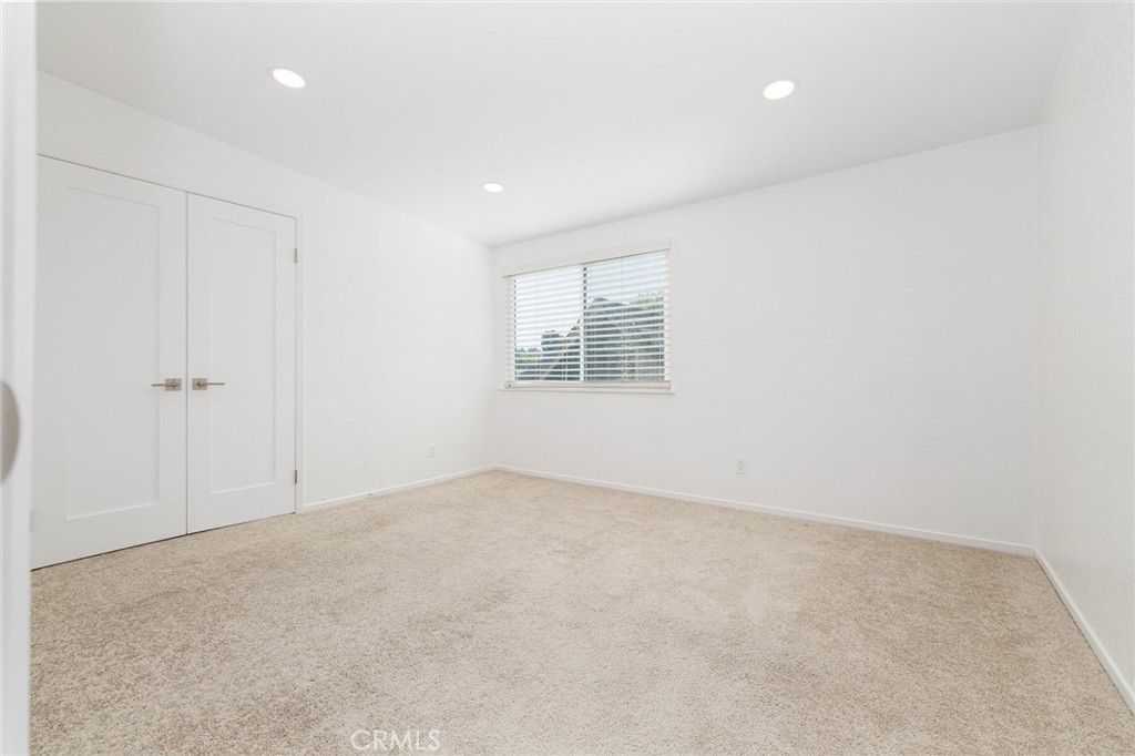 27139 Rio Prado Drive Valencia, CA 91354 - Photo 23 of 34 an empty room with a window
