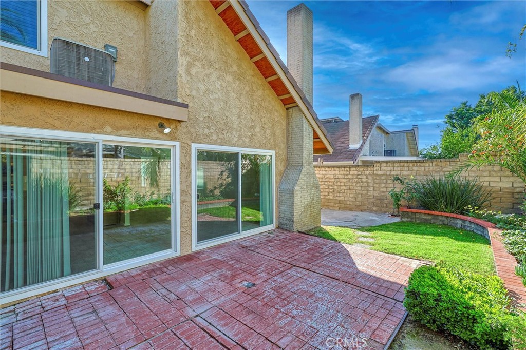 27139 Rio Prado Drive Valencia, CA 91354 - Photo 28 of 34 a view of a backyard with garden