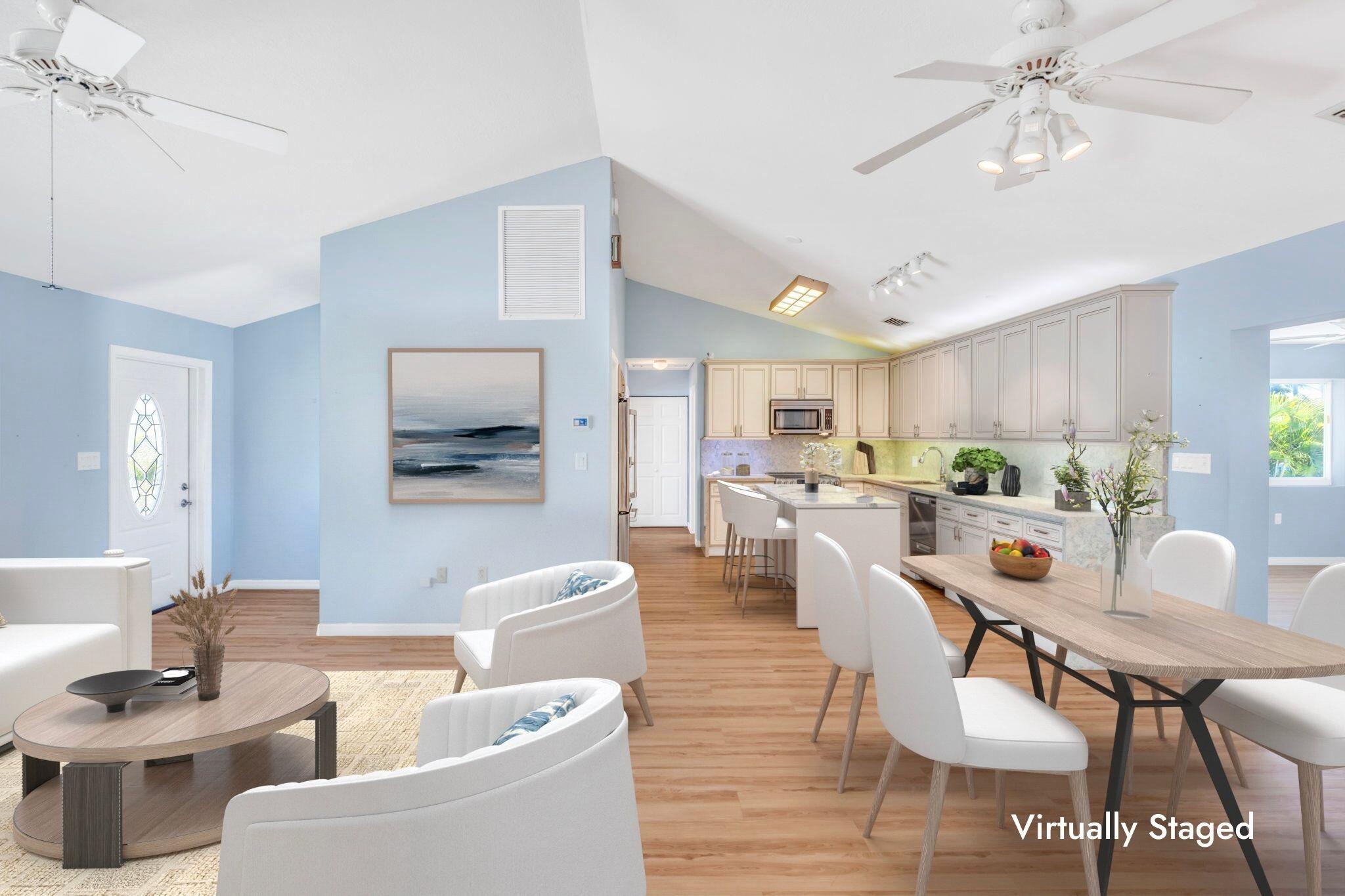 501 11th Street Key Colony Beach, FL 33051 - Photo 14 of 52 a view of a dining room with furniture and wooden floor