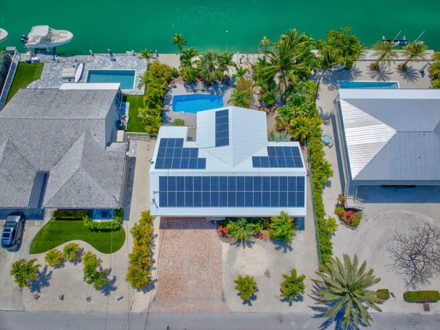 an aerial view of a house with a garden