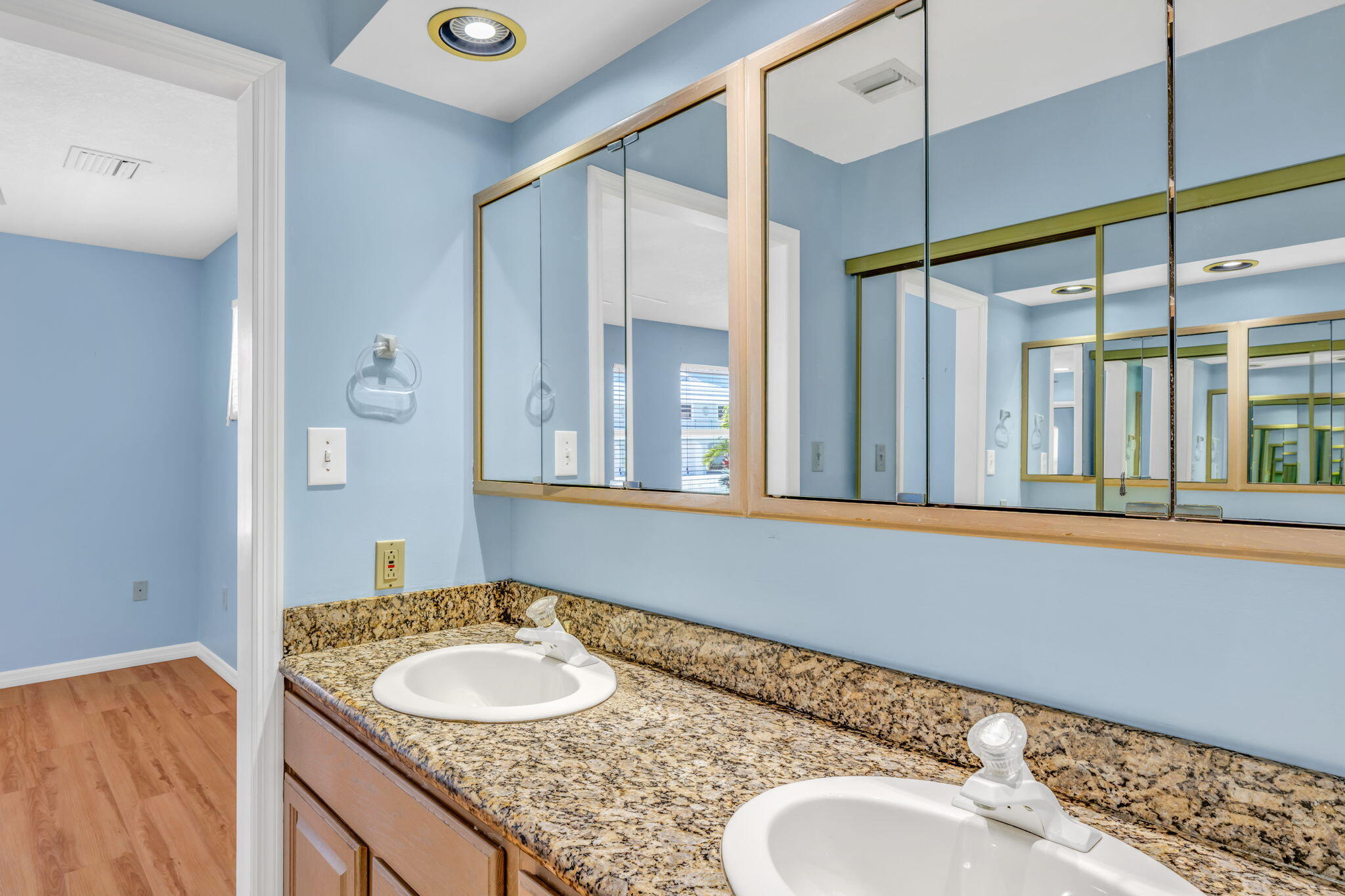 501 11th Street Key Colony Beach, FL 33051 - Photo 33 of 52 a bathroom with a granite countertop sink and a mirror
