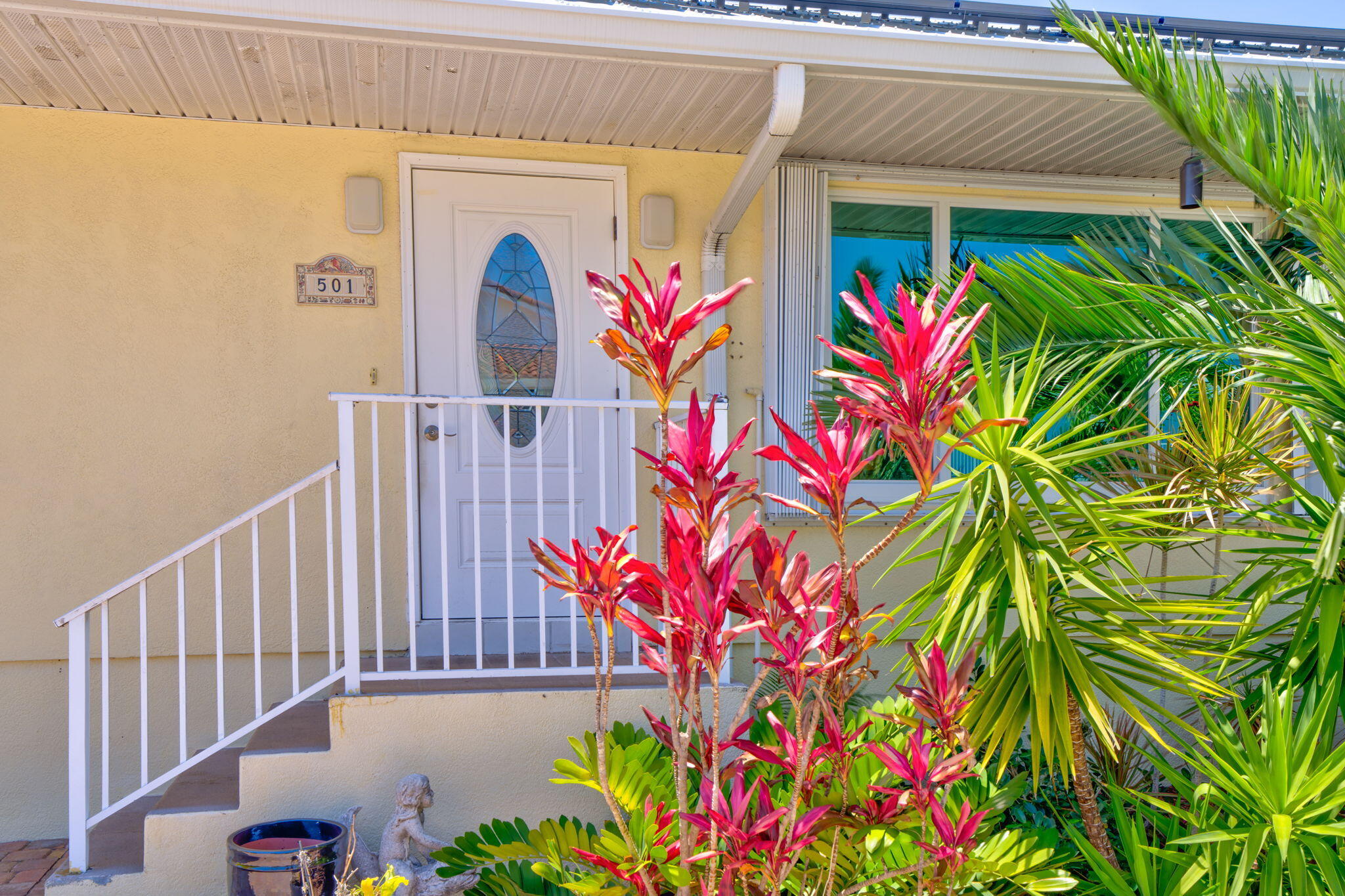 501 11th Street Key Colony Beach, FL 33051 - Photo 10 of 52 a view of front door and potted plant