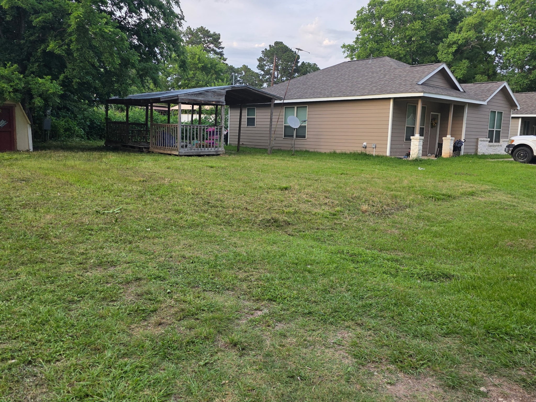 11369 Underwood Street Willis, TX 77318 - Photo 5 of 9 a view of a house with a yard