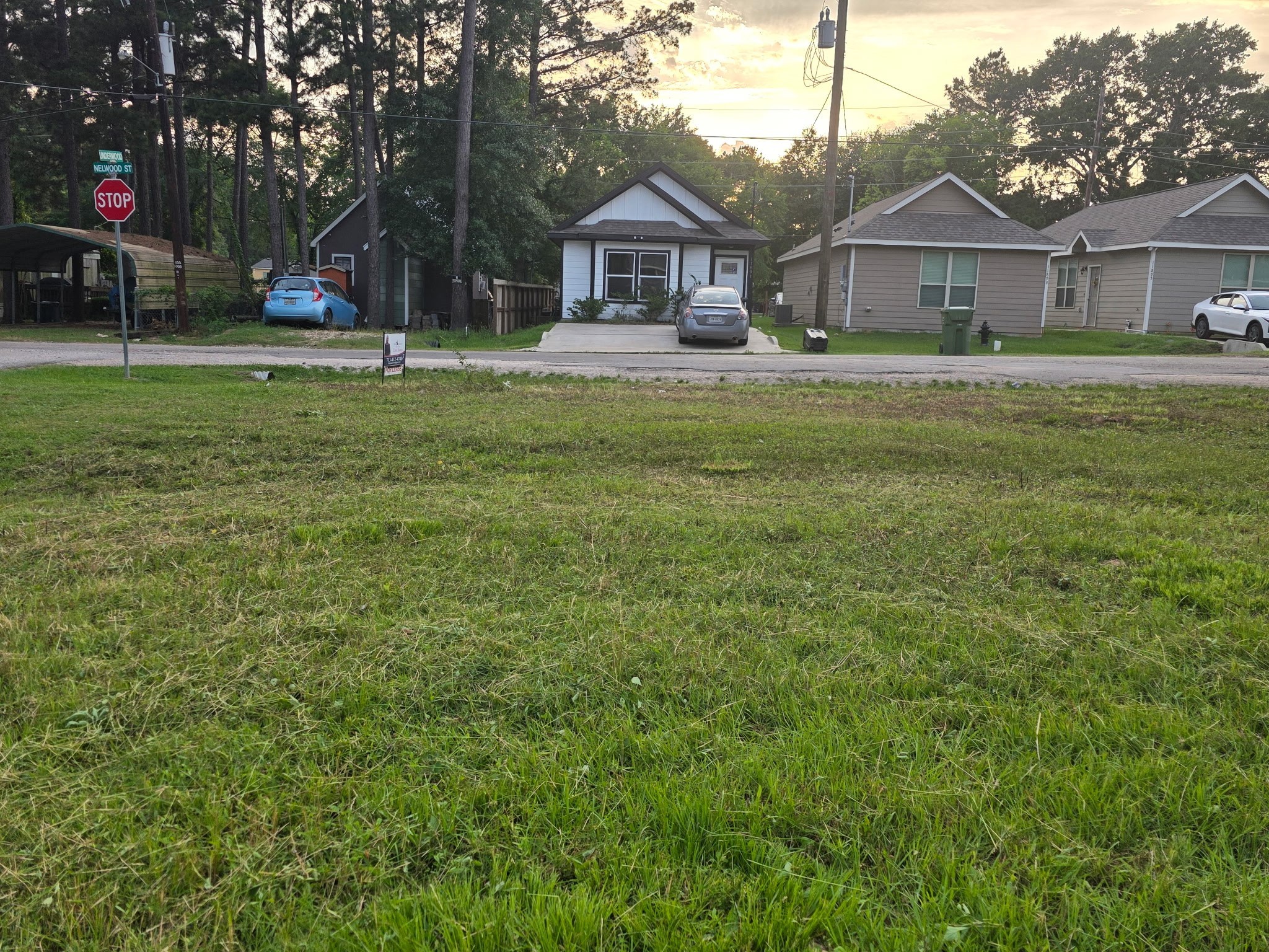 11369 Underwood Street Willis, TX 77318 - Photo 6 of 9 a front view of house with yard and green space