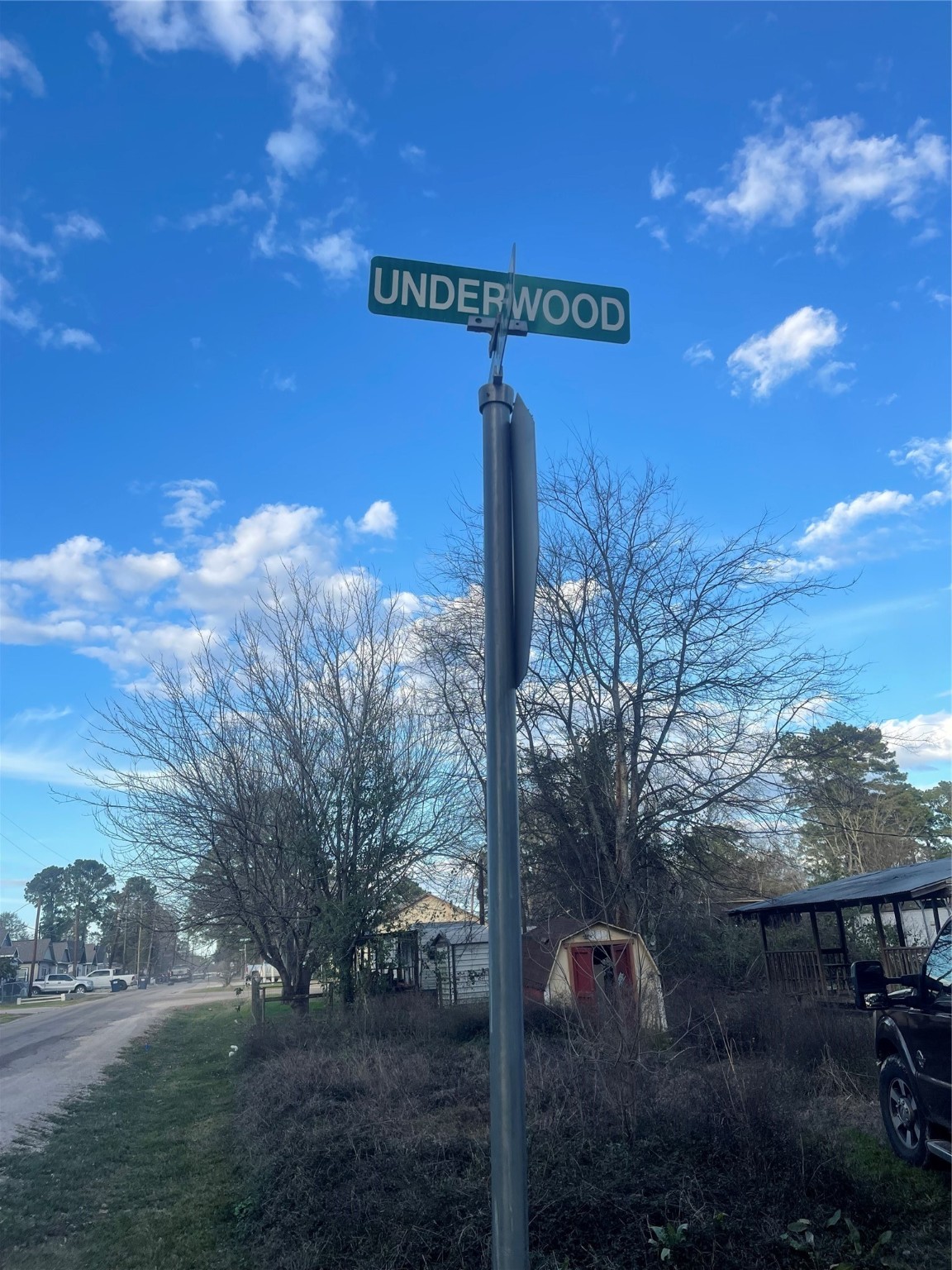 11369 Underwood Street Willis, TX 77318 - Photo 7 of 9 a view of a street with a building in the background