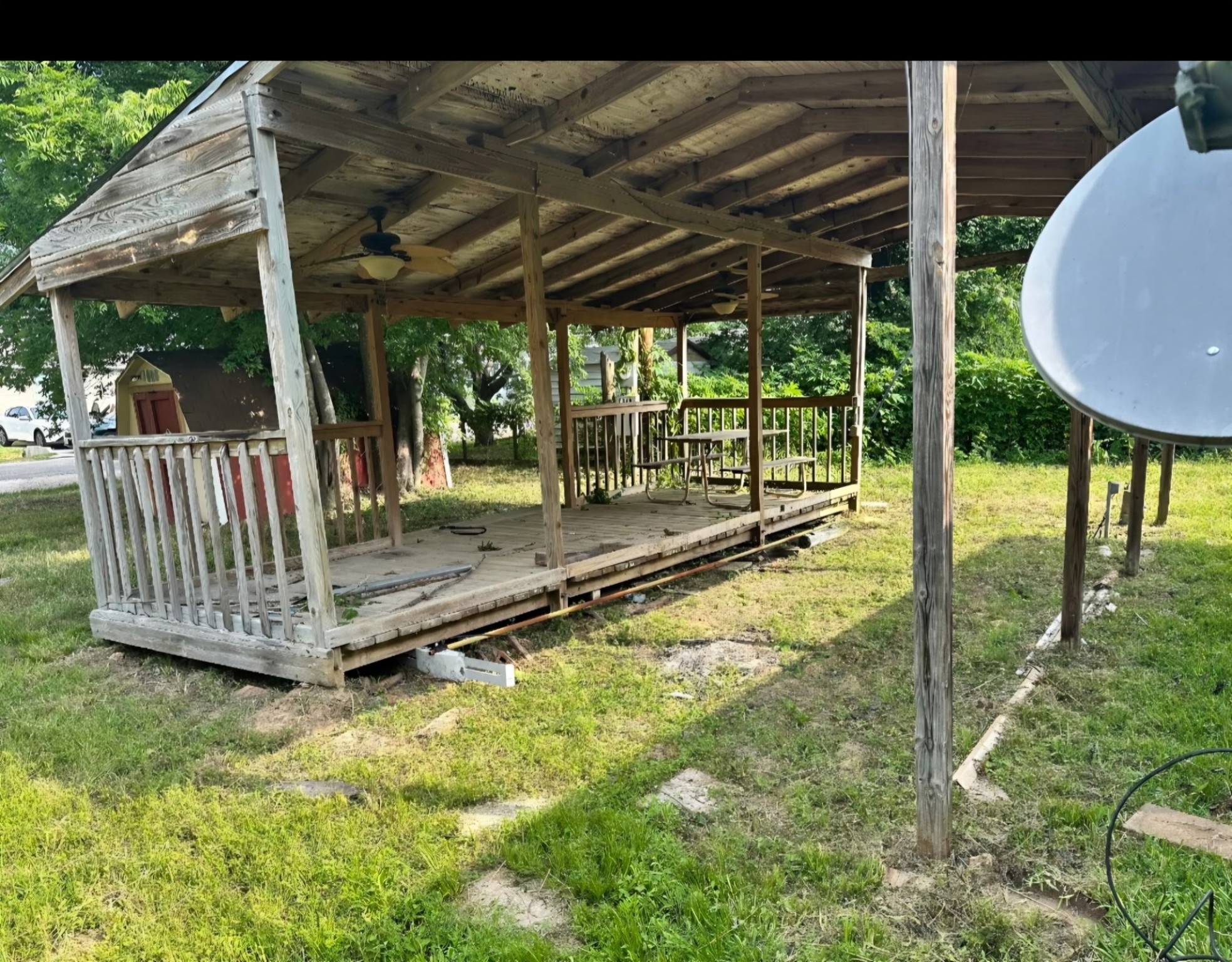 11369 Underwood Street Willis, TX 77318 - Photo 8 of 9 a view of a wooden deck with a backyard