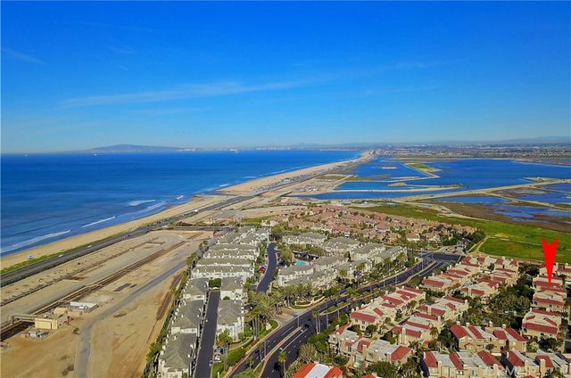 a view of a city with an ocean