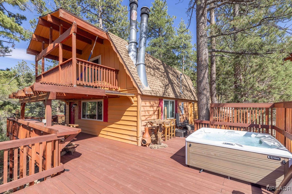 44185 Tim Ron Sugarloaf, CA 92386 - Photo 1 of 45 a view of a house with wooden deck