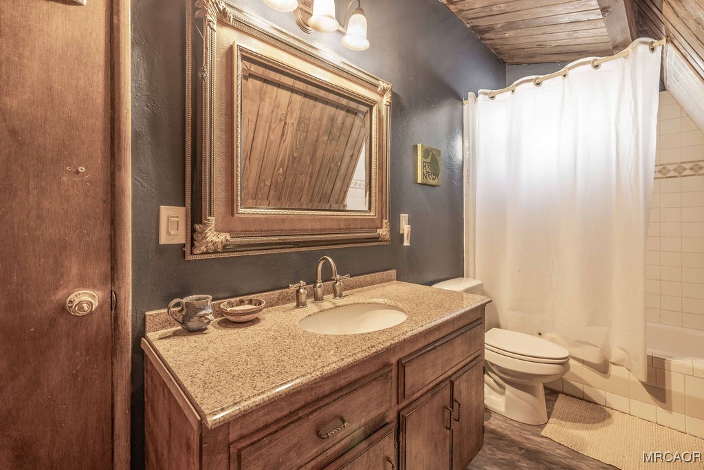 44185 Tim Ron Sugarloaf, CA 92386 - Photo 15 of 45 a bathroom with a granite countertop sink and a mirror